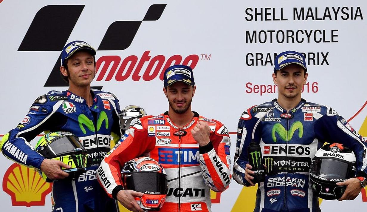 Tambahan 36 poin membuat Movistar Yamaha menggusur Repsol Honda dari puncak klasemen sementara tim MotoGP 2016. (AFP/Manan Vatsyayana)