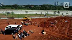 Suasana lahan baru Tempat Pemakaman Umum (TPU) khusus COVID-19, Jombang, Tangerang Selatan, Banten,Senin (26/7/2021). Pemkot Tangerang Selatan membuka lahan baru TPU khusus COVID-19 yang dapat menampung 800 makam. (merdeka.com/Arie Basuki)