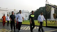 Presiden Jokowi melakukan lari pagi lari dari depan Istana Merdeka menuju Bundaran HI, Jakarta, Minggu (2/11/2014). (Rumgapres/Agus Suparto) 
