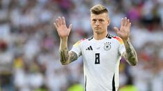 Di level klub, Kroos sudah lebih dulu pensiun setelah membawa Real Madrid menjuarai Liga Champions musim lalu. (AFP/Thomas Kienzle)