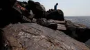Lukisan-lukisan batu terlihat di situs arkeologi Ponta das Lajes, di daerah pedesaan Manaus, Brasil, Sabtu, 28 Oktober 2023. (AP Photo/Edmar Barros)