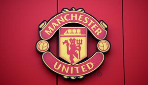 Logo Manchester United atau MU di Stadion Old Trafford. (Oli SCARFF / AFP)