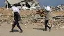 Badan kemanusiaan Perserikatan Bangsa-Bangsa (PBB) mengatakan bahwa 388.400 pergerakan pengungsian telah tercatat sejak pertengahan Agustus, sebagian besar dari berasal dari Kota Gaza. (Eyad BABA/AFP)
