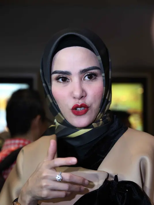 Selain menjadi produser film, ia juga ikut terlibat sebagai pemain di film yang diproduserinya. (Nurwahyunan/Bintang.com)