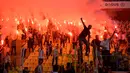 Jose Mourinho diklaim sudah menandatangani kontrak dengan durasi dua tahun untuk melatih Fenerbahce. (Yasin AKGUL/AFP)