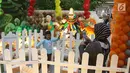 Seorang anak berfoto saat mengunjungi  Indonesia Balloon Art Festival (IBAF) 2018 di Mal Ciputra Jakarta, Jumat (29/6). IBAF 2018 ini, juga menjadi sarana edukasi bagi anak-anak sekarang yang lebih suka bermain dengan gadget. (Liputan6.com/Arya Manggala)
