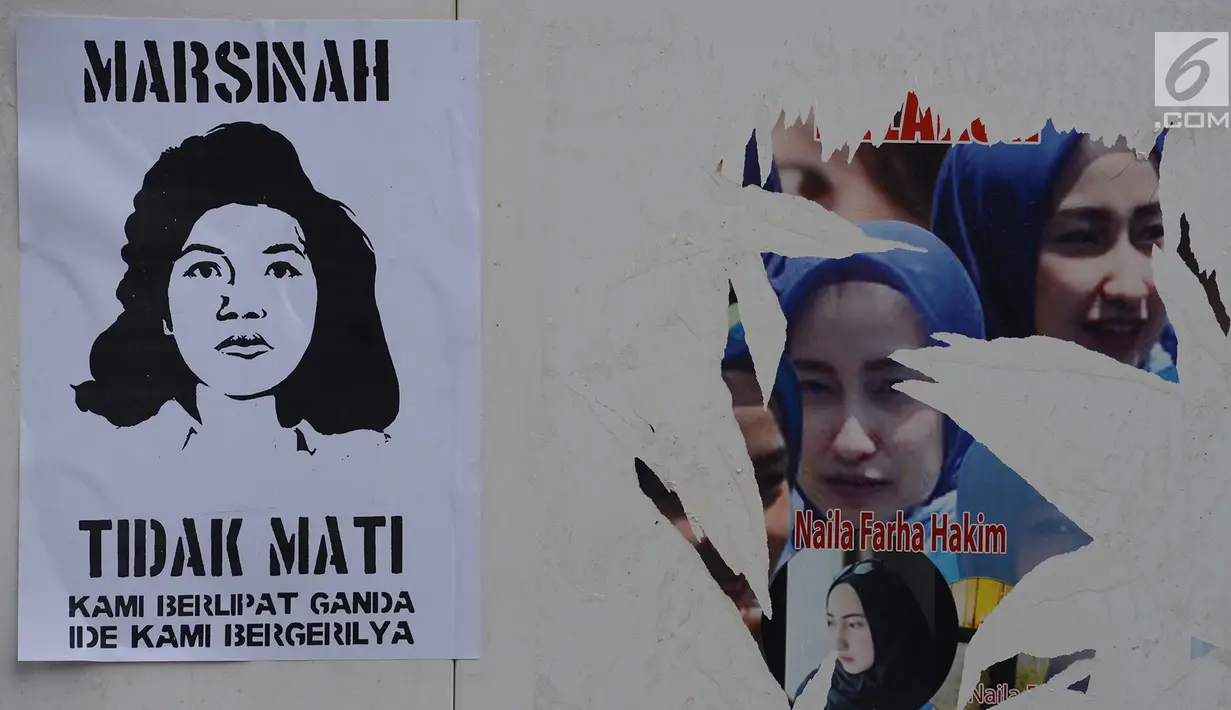 Selebaran tentang pejuang buruh Marsinah tertempel saat Buruh Internasional atau May Day di kawasan Bundaran HI, Jakarta, Rabu (1/5/2019). Buruh yang melakukan demo pada tahun ini memiliki berbagai tuntutan kepada pemerintah. (merdeka.com/Imam Buhori)