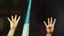 Para suporter Napoli berkumpul dan berpesta. Mereka merayakan sebuah kemenangan yang bukan sekadar kemenangan biasa, Napoli baru saja memastikan diri sebagai juara Serie A musim 2024/2025. (Alberto PIZZOLI/AFP)