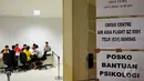 Suasana posko Crisis Centre AirAsia di Terminal 2 Bandara Internasional Juanda, Surabaya, Minggu (28/12/2014). (Liputan6.com/Johan Tallo)