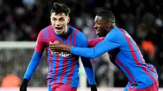 Barcelona berhasil meraup poin penuh saat bersua Sevilla pada laga pekan ke-30 La Liga. Mayoritas pemain Barca tampil impresif dalam pertandingan ini, dua di antaranya adalah Pedri dan Dembele. (AFP/Lluis Gene)