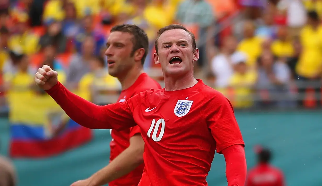 Wayne Rooney memimpin top scorer timnas Inggris dengan 53 gol, Gol pertama Rooney untuk Inggris pada tanggal 6 september 2003. Rooney berpeluang menambah  gol jika tampil pada Piala Dunia 2018. (Richard Heathcote/Getty Images/AFP)
