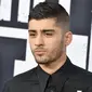 Mantan Personel One Direction, Zayn Malik baru - baru mengeluarkan single terbarunya yang berjudul " PILLOWTALK ", di video klip ini Zayn beradegan mesra dengan model internasional, Gigi Hadid. (KEVIN WINTER / GETTY IMAGES NORTH AMERICA / AFP)