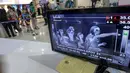 Sebuah monitor terhubung ke pemindai menunjukkan suhu tubuh penumpang yang tiba di Bandara Internasional Bangkok Suvarnabhumi, Thailand, Minggu (21/6/2015). WHO mencatat ada 1.334 kasus MERS di 26 negara. (REUTERS/Kerek Wongsa)
