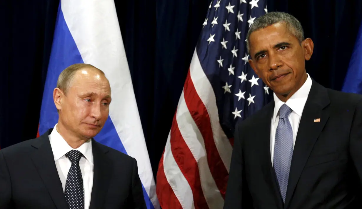 Presiden AS, Barack Obama dan Presiden Rusia, Vladimir Putin saat bertatap muka pada Sidang Umum PBB di New York, Senin (28/9/2015). (REUTERS/Kevin Lamarque)