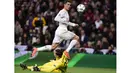 Cristiano Ronaldo mencetak satu gol saat timnya menang melawan AS Roma pada leg kedua babak 16 besar liga Champions di Stadion Santiago Bernabeu, Madrid, (AFP/Javier Soriano)