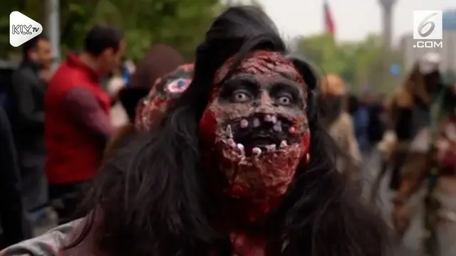Ratusan penduduk Chili berpakaian seperti zombie dan berjalan di sepanjang jalan Amerika Serikat.