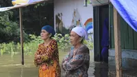 Waduk PLTA meluap dan mengakibatkan banjir rendam ribuan rumah di Riau (Liputan6.com/M.Syukur)