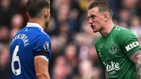 James Tarkowski dan Jordan Pickford terus menjadi andalan di lini belakang Everton (AFP/Paul Ellis)