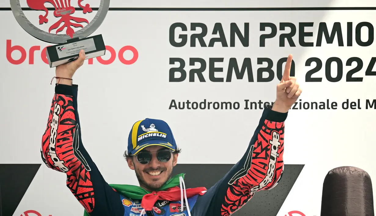 Hingga putaran terakhir, posisi Francesco Bagnaia nyaris tidak tersentuh oleh pembalap lain. (Marco BERTORELLO/AFP)