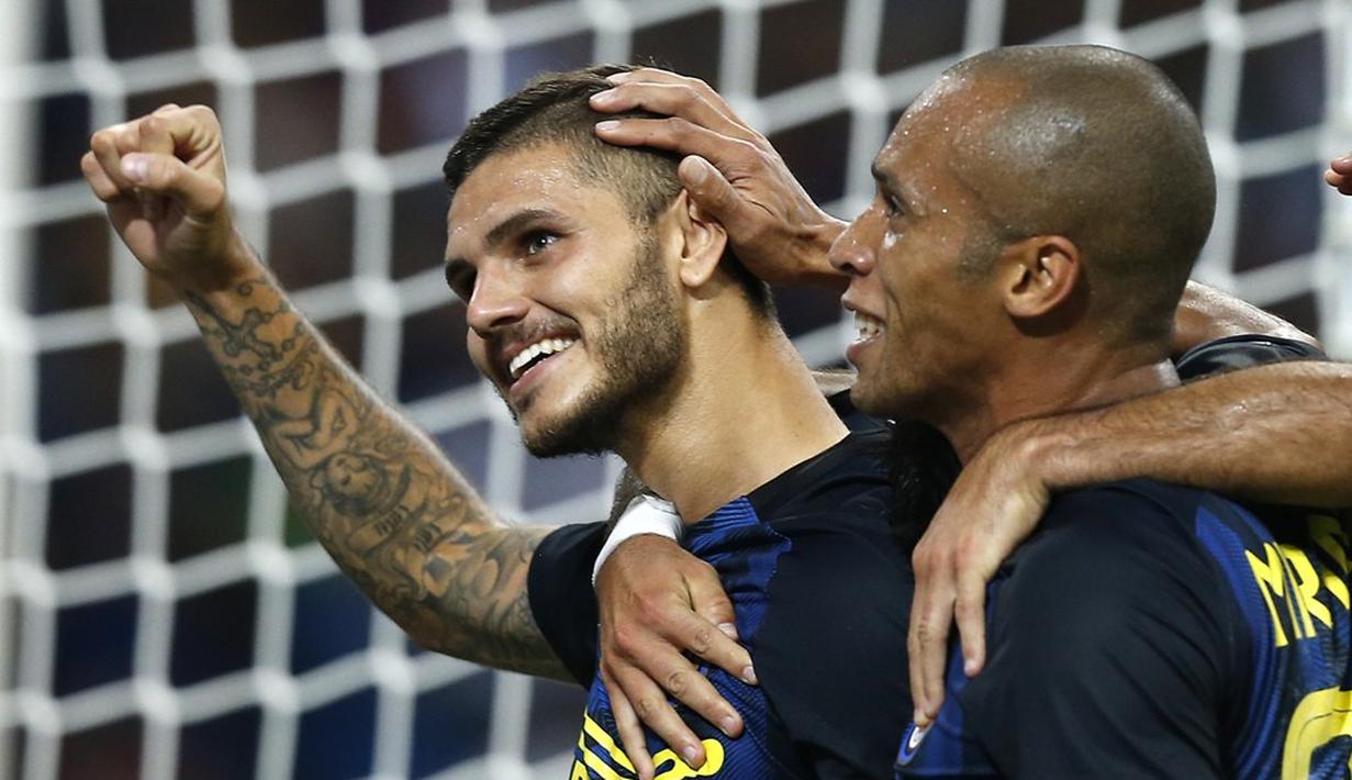 Inter Milan meraih kemenangan 2-1 atas Juventus dalam laga pekan keempat Serie A yang berlangsung di Giuseppe Meazza, Minggu (18/9/2016) malam WIB. Dua gol Inter dicetak Mauro Icardi dan Ivan Perisic. (AFP/Marco Bertorello)