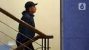 Wali Kota Madiun, Maidi berjalan menuju ruang pemeriksaan di Gedung Merah Putih Komisi Pemberantasan Komisi Pemberantasan Korupsi (KPK), Jakarta, Senin (19/1/2026). (Liputan6.com/Helmi Fithriansyah)