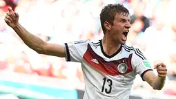 Di laga perdana babak penyisihan Piala Dunia 2014 Grup G melawan Portugal, (16/6/2014), Thomas Mueller tampil impresif dengan mencetak tiga gol, salah satunya lewat titik putih. (REUTERS/Dylan Martinez)