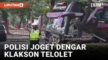 Gokil! Polisi Lalu Lintas Berjoget saat Dengar Klakson Telolet Bus