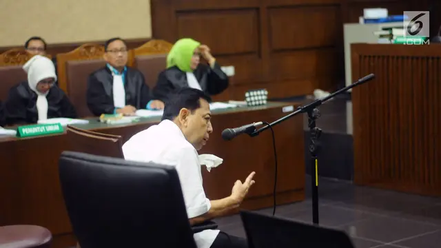 Dipapah Petugas, Setya Novanto Jalani Sidang Dakwaan Korupsi E-KTP