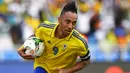 Pierre-Emerick Aubameyang. Striker Gabon berusia 32 tahun ini telah memasuki musim kelimanya bersama Arsenal musim 2021/2022 ini. Bersama Timnas Gabon, ia menjadi pencetak gol terbanyak dengan torehan 26 gol dari 62 laga. Pesaing terdekatnya adalah Malick Evouna (12 gol). (Foto: AFP/Gabriel Bouys)