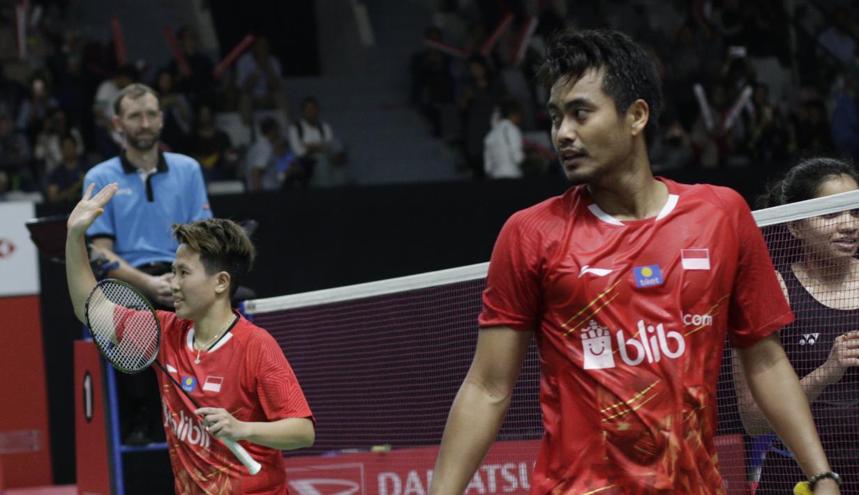Pebulutangkis Indonesia, Tontowi Ahmad / Lilyana Natsir, merayakan kemenangan atas pasangan India pada Indonesia Masters 2019 di Istora Senayan, Jakarta, Selasa (22/1). Tontowi / Lilyana lolos ke babak kedua. (Bola.com/M. Iqbal Ichsan)