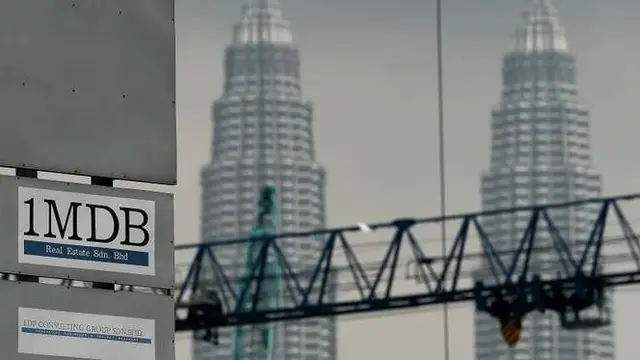 Ilustrasi skandal 1MDB Malaysia (AFP PHOTO/Manan Vatsyayana)