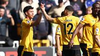 Gelandang Wolverhampton Wanderers, Matheus Nunes, mencetak gol ke gawang Chelsea pada laga pekan ke-30 Premier League 2022/2023 yang digelar di Molineux Stadium, Sabtu (8/4/2023) malam WIB. (AFP/Darren Staples)