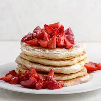 ilustrasi pancake stroberi/istetiana/Shutterstock