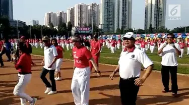 Kepala KSP dan Menaker menghadiri perayaan May Day yang diadakan di GOR Soemantri, Jakarta.