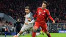 Aksi penyerang Liverpool, Roberto Firminho pada leg kedua, babak 16 besar Liga Champions yang berlangsung di Stadion Allianz Arena, Munchen, Kamis (14/3). Liverpool menang 3-1. (AFP/Mathias Balk)