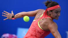 Petenis Caroline Garcia asal Perancis saat beraksi di China Open tennis tournament, Beijing, Selasa (06/10/2015).  (AFP Photo / Wang Zhao)
