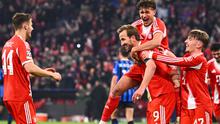 Para pemain Bayern Munchen merayakan gol Harry Kane setelah mencetak gol melawan Atalanta Bergamo, Kamis (19-3-2026) dini hari WIB, di Munich, Jerman. (Tom Weller/dpa via AP)