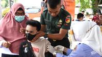 Pelayanan vaksinasi di posko Belle Li Mbui Kota Gorontalo Foto:Humas, Rabu (30/11/2022).