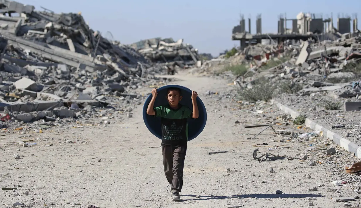 Sebelumnya, kesepakatan damai antara Israel dan milisi Hamas mencakup sejumlah poin penting, di antaranya penghentian total semua aksi permusuhan, penarikan pasukan Israel dari Gaza, pembukaan akses penuh untuk masuknya bantuan kemanusiaan, serta pertukaran tahanan antara kedua belah pihak. (Eyad BABA/AFP)