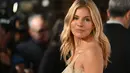 <p>Sienna Miller tiba untuk acara National Board of Review Awards Gala di Cipriani 42nd Street di New York City pada 8 Januari 2023. Sienna tampak seperti supermodel saat berada acara megah itu. (AFP/Angela Weiss)</p>