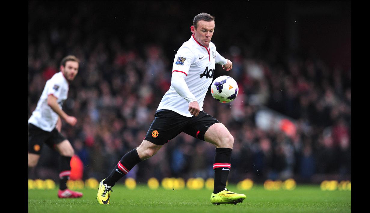 Bukan hanya gol dari tengah lapangan, Wayne Rooney juga dua kali mencetak hat-trick ke gawang West Ham, masing-masing sekali saat berseragam Manchester United dan Everton. (AFP/Carl Court)