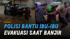 Sebuah banjir terjadi di sebuah daerah. nampak ada aksi heroik yang dilakukan oleh dua anggota polisi.
