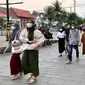 Warga sedang berkunjung ke Kota Tua, Jakarta Barat sambil mengenakan masker karena masih di tengah pandemi COVID-19. (28/8/2022) Foto: Liputan6.com/ Ade Nasihudin).