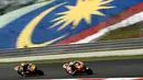 Marc Marquez menjadi yang tercepat dengan catatan waktu 2 menit 01,210 detik yang dicatat saat latihan bebas pertama MotoGP Malaysia, Jumat (28/10/2016). (AFP/Manan Vatsyayana)