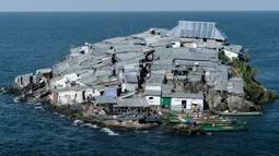 Gambar 5 Oktober 2018, pandangan umum pulau Migingo di Danau Victoria, perbatasan Uganda dan Kenya. Pulau ini adalah tempat tinggal bagi 131 orang (menurut sensus 2009) yang tinggal di rumah berdinding seng dan tumpang tindih. (Yasuyoshi CHIBA/AFP)