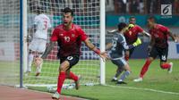 Penyerang Indonesia, Stefano Lilipaly melakukan selebrasi usai membobol gawang Uni Emirat Arab (UEA) pada Asian Games 2018 di Stadion Wibawa Mukti, Jawa Barat, Jumat (24/8/2018). Indonesia kalah dari UEA lewat adu penalti. (Bola.com/Vitalis Yogi Trisna)