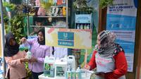Refill station di Bank Sampah untuk menekan jumlah sampah plastik yang terbuang percuma. (dok. Yayasan Rumah Pelangi)