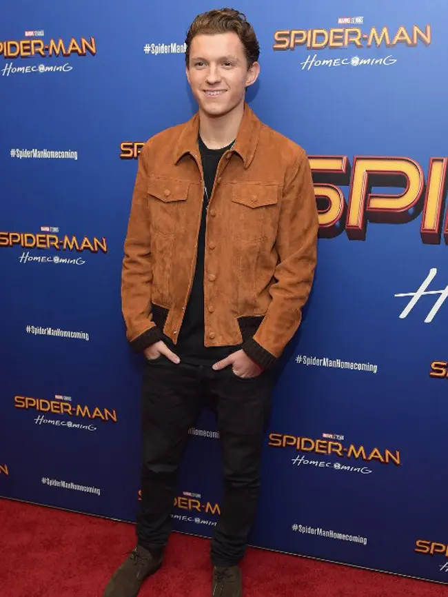 Kemunculan Tom Holland sebagai Spider-Man pertama kali di film Captain America: Civil War di tahun 2016. Film terbarunya yang berjudul Spider-Man: Homecoming baru saja rilis di Indonesia pada 5 Juli 2017 kemarin. (AFP/Bintang.com)