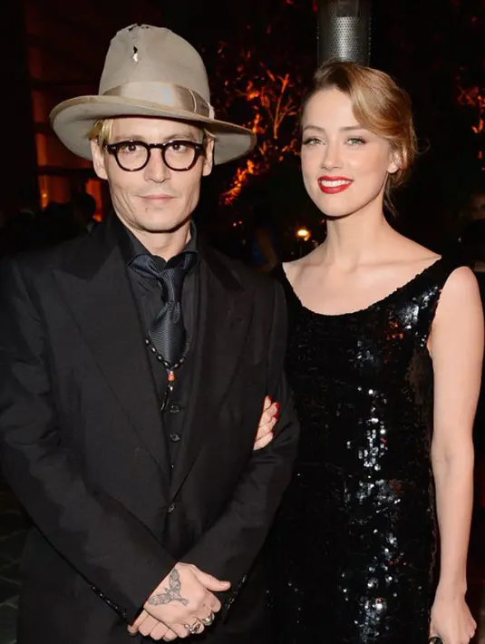 Meskipun begitu, Amber Heard masih menaruh harapan yang tinggi agar seorang Johnny Depp kembalikan niat semulanya, mendukung rencana Amber mendonasikan hartanya untuk orang-orang yang membutuhkan. (AFP/Bintang.com)