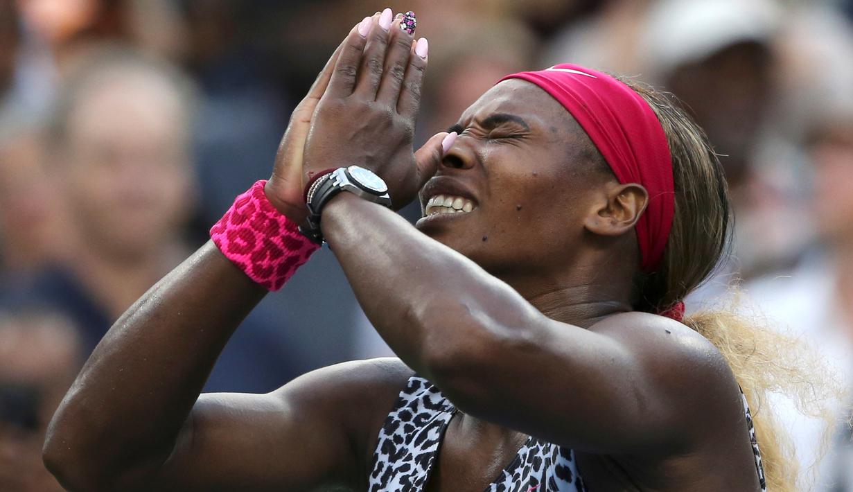 Ekspresi Serena Williams setelah memenangi AS Terbuka 2014 dengan mengalahkan Caroline Wozniacki. (AP Photo/Mike Groll)
